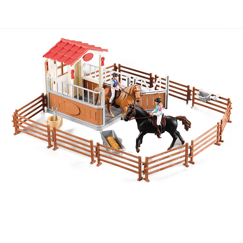 Stable with fence and horses